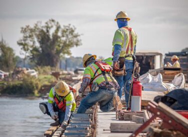 closeup of construction workers on SH 334 Bridge