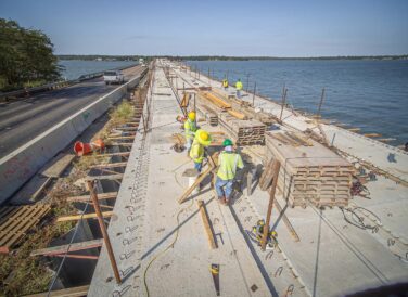 workers constructing SH 334 Bridge and Roadway