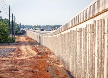side view of rampway concrete wall Tomball Tollway