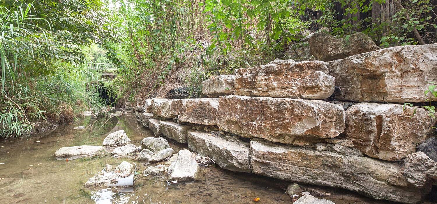 Blunn Creek channel with rock wall