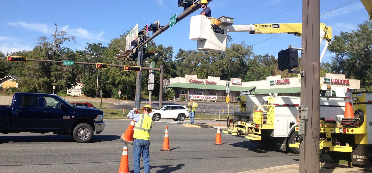 crew working on traffic lights for US 90 ITS project