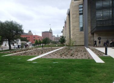 San Antonio Federal Courthouse in the city by sidewalk