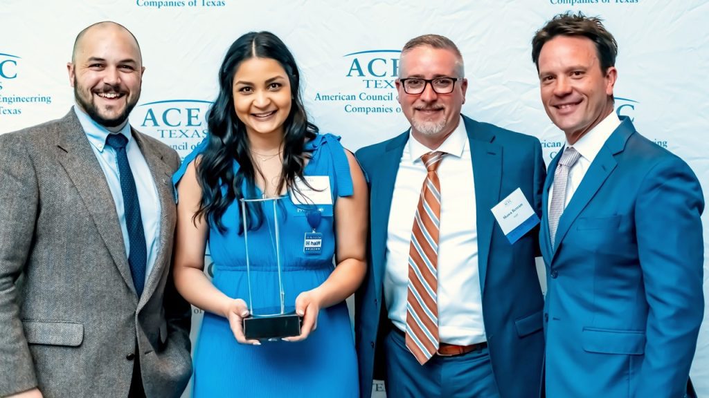 group of 4 Halff and attendees accepting 2023 ACEC Texas Engineering Excellence Award