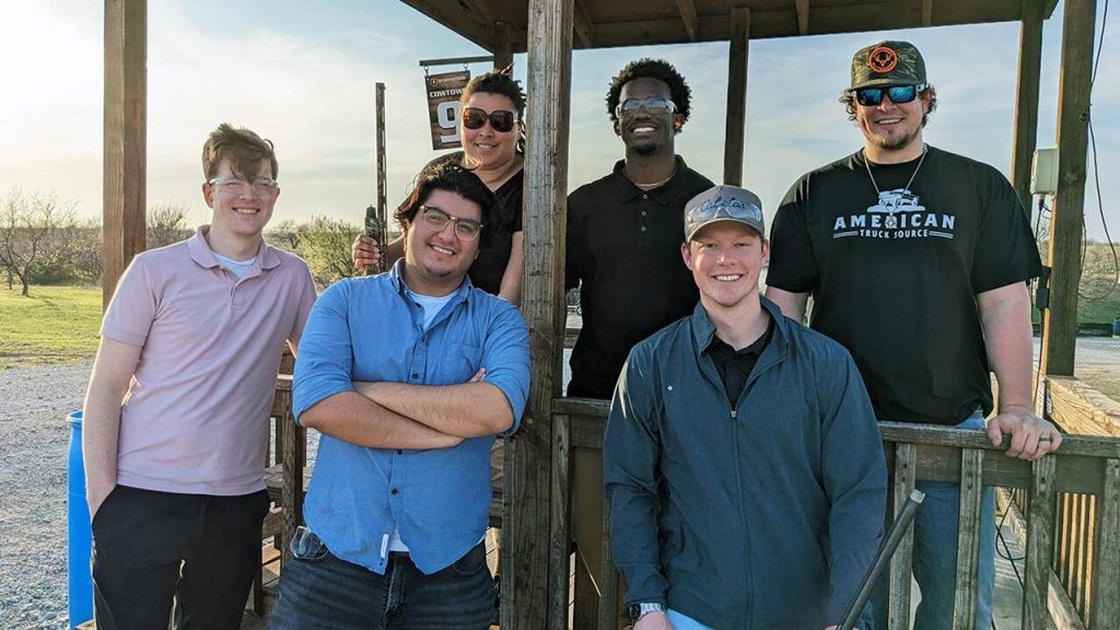 Fort Worth Halff team photo under skeet shooting station
