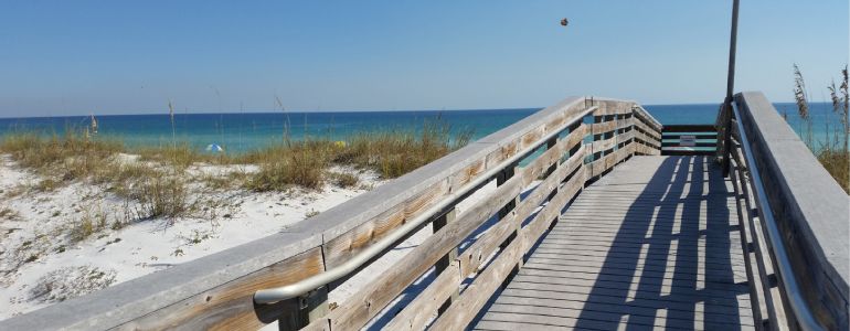 Bridge to the beach and sea at Navarre Beach, Florida