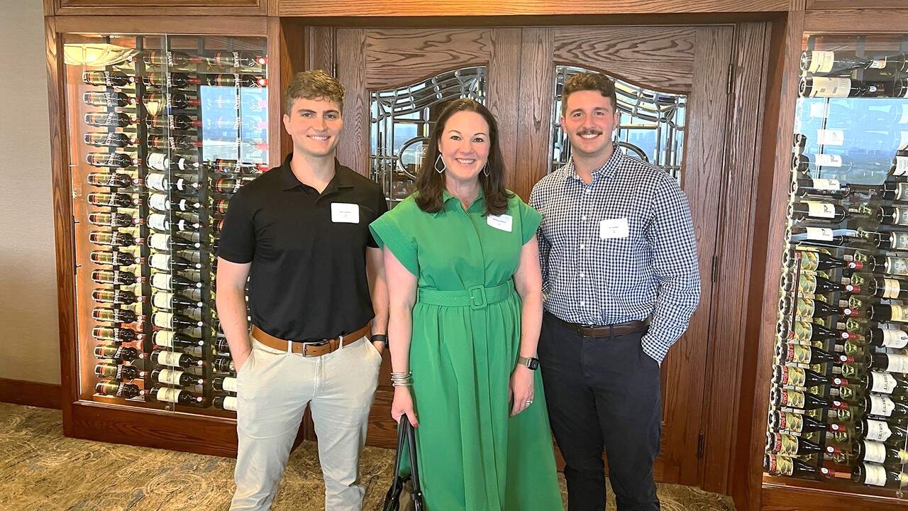 two Frisco and Richardson interns with chief people officier Jessica Baker Daily at July ACEC Dallas monthly meeting