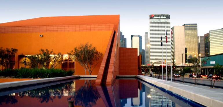 Exterior of the Latino Cultural Center in Dallas, Texas, at dusk