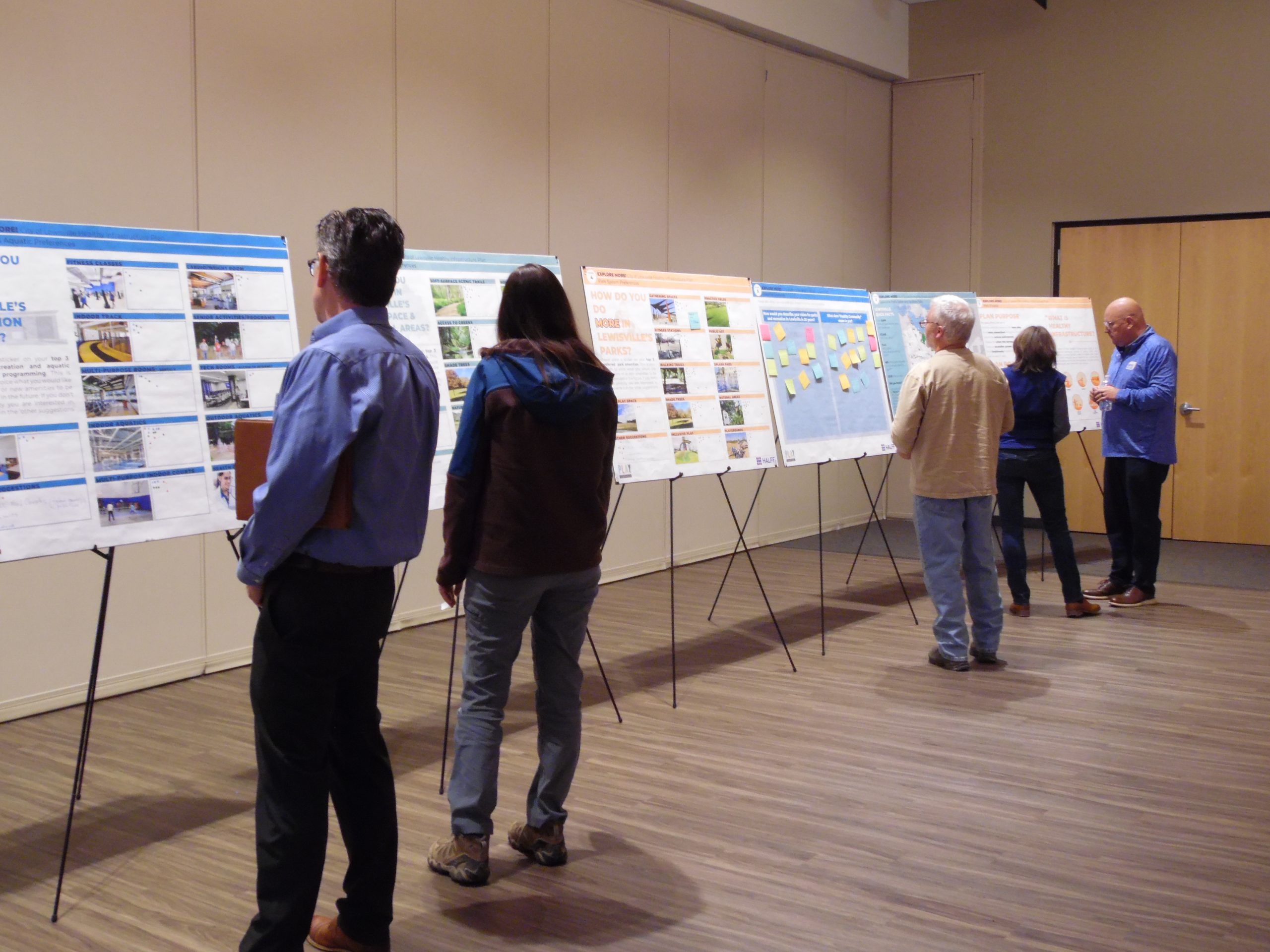 Community members reviewing visioning plan from Explore More Lewisville