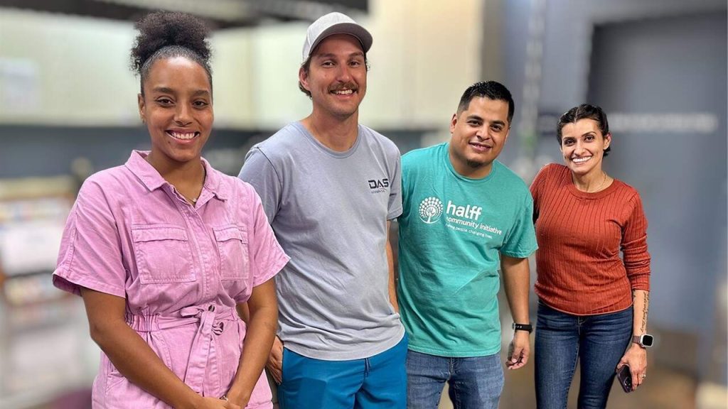 Four Austin Halff employees at the Ronald McDonald House kitchen volunteering event