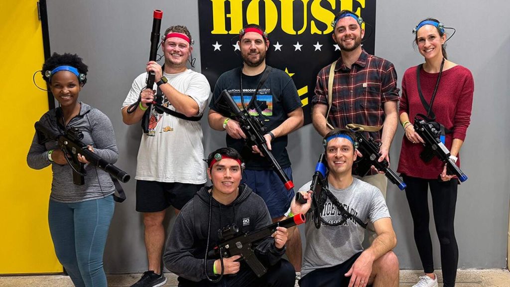 Frisco Halff team group photo after playing laser tag together