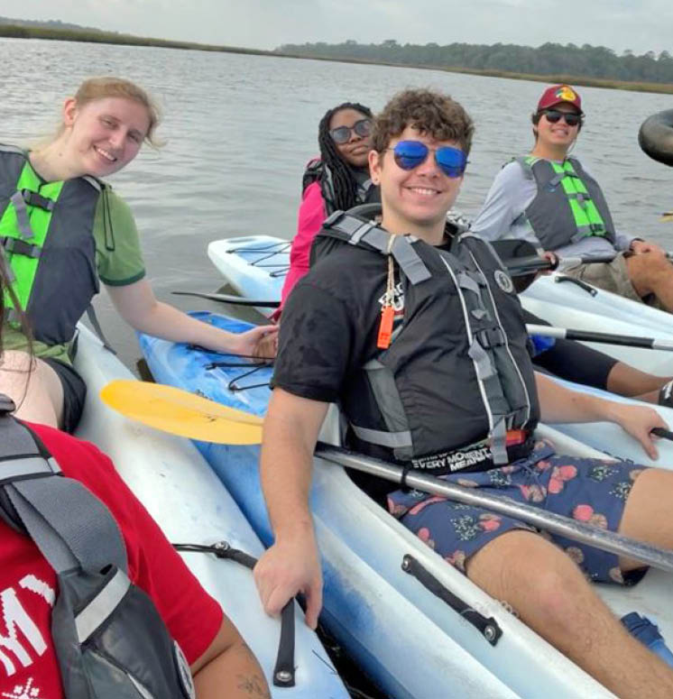 Jacksonville FL employees kayaking together