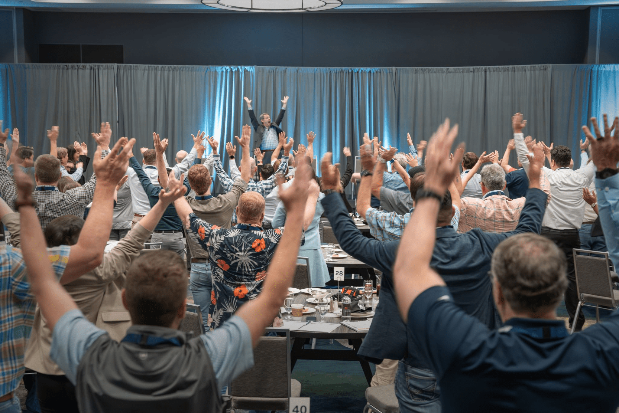 Halff Leadership Forum Joel Zeff session with raising hands March 2024
