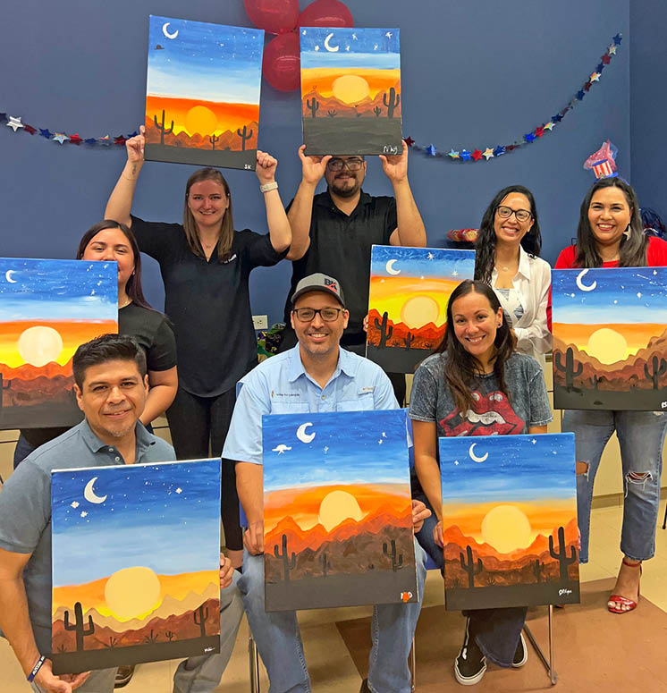 McAllen team building paint with a twist outing in July 2023